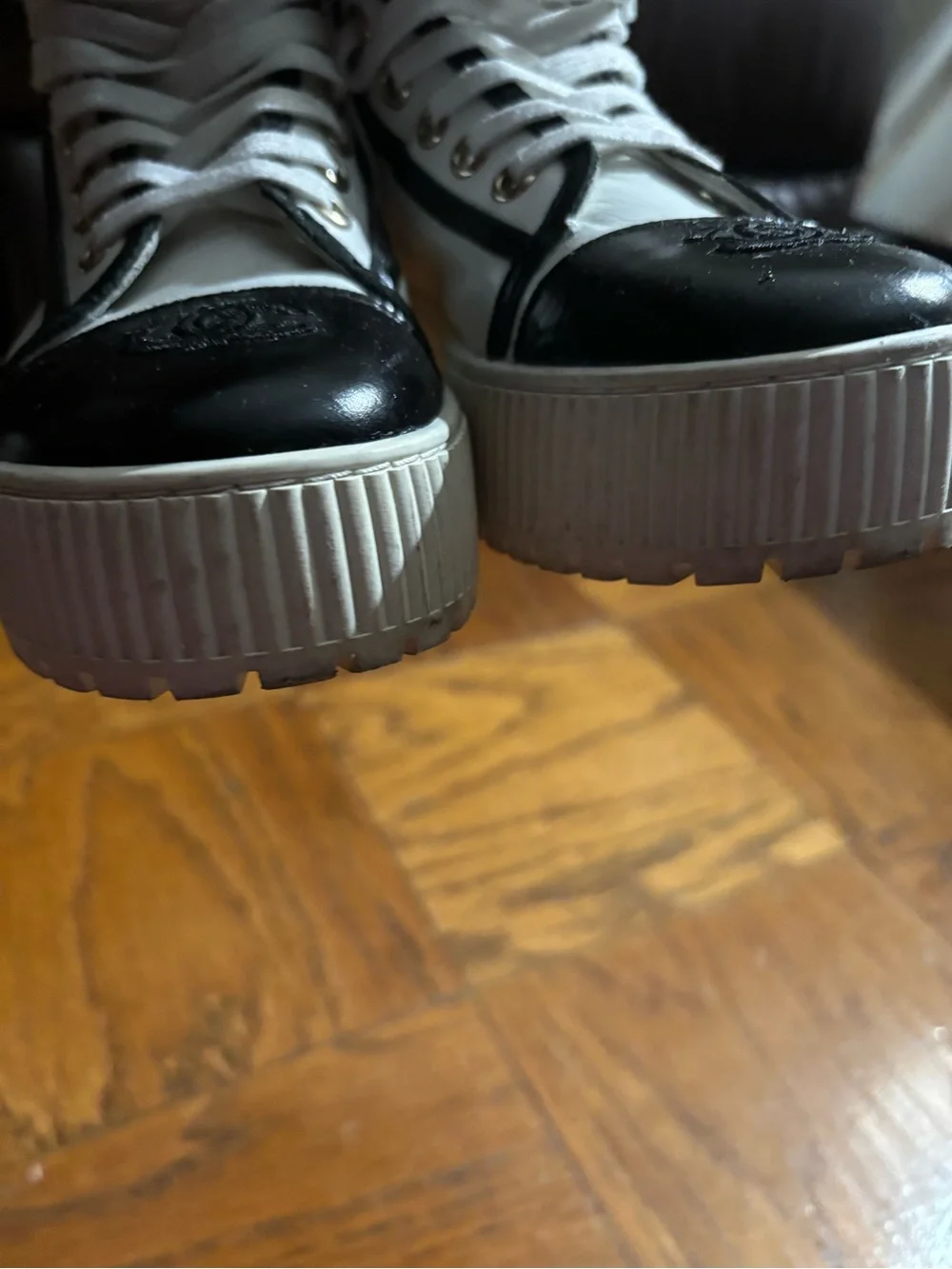 CHANEL White and Black Logo High-Top Sneakers